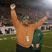 In this September 2006 photo provided by Michigan State University, former Michigan State football player Bubba Smith raises his arms during a ceremony at which his jersey number was retired, in East Lansing, Mich. Smith  was a former NFL defensive star.