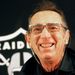 Oakland Raiders owner Al Davis laughs at a reporter's remarks at a news conference Tuesday, Nov. 26, 1996 in Oakland, Calif. Davis talked at length about not being able to sell out the "personal seat licenses" at Oakland Coliseum. 