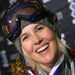 In this Jan. 23, 2009 file photo, Sarah Burke, of Canada, holds her gold metal after winning the Women's Superpipe event at Winter X Games 13 at Buttermilk Ski Area, near Aspen, Colo.