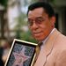 In a Thursday, Feb. 27, 1997 file photo, television producer Don Cornelius holds a plaque on the Hollywood Walk of Fame after the unveiling of his star in Los Angeles. Cornelius, creator of the long-running TV dance show "Soul Train," shot himself to death Wednesday morning, Feb. 1,2012 at his home.