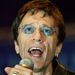 This Saturday, Sept. 25, 2004, file photo shows former Bee Gees singer Robin Gibb, performing a song at the beginning of a show match between former German tennis star Steffi Graf and Argentina's Gabriela Sabatini at the Max-Schmeling-Halle hall on in Berlin.