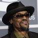 In this Feb. 13, 2011 file photo, Chuck Brown arrives at the 53rd annual Grammy Awards in Los Angeles. Brown, who styled a unique brand of funk music as a singer, guitarist and songwriter known as the "godfather of go-go," died Wednesday, May 16, 2012 after suffering from pneumonia. He was 75.