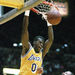 This May 1, 1989 file photo shows Los Angeles Lakers' Orlando Woolridge dunking over Portland's Kevin Duckworth during an NBA game in Inglewood, Calif. Former NBA standout Orlando Woolridge has died at his parents' home in Mansfield, La. He was 52. 