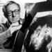 This Dec. 8, 1966 file photo shows science fiction writer Ray Bradbury looks at a picture that was part of a school project to illustrate characters in one of his dramas in Los Angeles. Bradbury, who wrote everything from science-fiction and mystery to humor, died Tuesday, June 5, 2012 in Southern California. He was 91. 