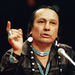 In a Jan. 31, 1989 file photo, Russell Means, who heads the American Indian Movement, (AIM) testifies before a special investigative committee of the Senate Select Committee on Capitol Hill, in Washington. Means, a former American Indian Movement activist who helped lead the 1973 uprising at Wounded Knee, reveled in stirring up attention and appeared in several Hollywood films, died early Monday, Oct. 22, 2012 at his ranch Zzxin Porcupine, S.D., Oglala Sioux Tribe spokeswoman Donna Solomon said. He was 72. (AP Photo/Marcy Nighswander, File)