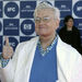 Film critic Roger Ebert gives thumbs up as he arrives for the 2004 IFP Independent Spirit Awards in Santa Monica, Calif., in a Saturday, Feb. 28, 2004 file photo.