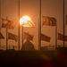 The American flags surrounded the Washington Monument fly at half-staff as ordered by President Barack Obama following the deadly shooting Monday at the Washington Navy Yard, Tuesday morning, Sept. 17, 2013, in Washington.