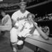 In this August 1966 file photo, Baltimore Orioles outfielder Paul Blair sits on a bench with his son Terry on the annual Father and Son Night in Baltimore. Young Terry chews on the end of a plastic bat. In the background, watching his three sons, is Brooks Robinson. Blair, the eight-time Gold Glove center fielder who helped the Orioles win World Series titles in 1966 and 1970, has died. He was 69. Blair died Thursday night, Dec. 26, 2013, at Sinai Hospital of Baltimore, according to a hospital spokeswoman.