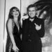 In this April 1980 file photo, Swiss artist H.R. Giger, right, poses with model Anneka Vasta at the opening of an exhibition in New York. H.R. Giger, who designed the creature in Ridley Scott's sci-fi horror classic "Alien," has died at age 74 from injuries suffered in a fall. Sandra Mivelaz, administrator of the H.R. Giger museum in Chateau St. Germain told The Associated Press Tuesday May 13, 2014 that Giger had died in a hospital the day before. Giger received a 1979 Academy Award for special effects in 'Alen'.