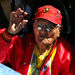 This Oct. 3, 2009 photo shows Navajo Code Talker Chester Nez speaking to a woman outside an Albuquerque, N.M., tourist shop during a book signing event for "Navajo Weapon." Only three of the Original 29 Code Talkers survive, and Nez is one of them.