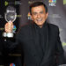 In this Oct. 27, 2003 file photo, Casey Kasem poses for photographers after receiving the Radio Icon award during The 2003 Radio Music Awards at the Aladdin Resort and Casino in Las Vegas. Kasem, the smooth-voiced radio broadcaster who became the king of the top 40 countdown, died Sunday, June 15, 2014, according to Danny Deraney, publicist for Kasem's daughter, Kerri. He was 82. 