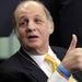 James Brady, the press secretary for President Ronald Reagan, wears a blue bracelet in support of wounded Arizona Rep. Gabrielle Giffords as he visits the James S. Brady Press Briefing Room on the 30th anniversary of the assassination attempt on President Ronald Reagan, Wednesday, March 30, 2011. (AP Photo/Charles Dharapak)