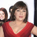 In this Dec. 3, 2008 file photo, Elizabeth Pena poses as she arrives for the Los Angeles premiere of "Nothing Like the Holidays," in Los Angeles. The "La Bamba" and "Lone Star" actress Pena, 55, has died. Pena's manager, Gina Rugolo, said the actress died Tuesday, Oct. 14, 2014, in Los Angeles of natural causes after a brief illness. (AP Photo/Mark J. Terrill, file)