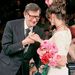 Yves St Laurent, left, kisses the bride's hand at the end of his presentation of his 1998 spring summer high fashion show in Paris Wednesday Jan. 21, 1998.