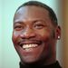 Jerome Kersey smiles during a news conference Wednesday, Sept. 24, 1997 in Seattle, announcing his signing with the Seattle SuperSonics for a one-year contract. Kersey, 35, is entering his 14th NBA season after playing last season with the Los Angeles Lakers. (AP Photo/Elaine Thompson)