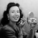 In this Jan. 24, 1964 file photo, Jenny Wallenda, a member of the famous Wallenda high wire act, applies makeup in a dressing room prior to appearing at opening of the Shrine Circus in Detroit. Wallenda, the matriarch of the famous family of high-flying circus performers, died late Saturday, April 4, 2015, at her home in Sarasota, Fla., according to family members. She was 87. (AP Photo/Alvan Quinn, File)