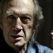 Actor David Carradine poses for a photo at his home in the Tarzana section of Los Angeles, Wednesday, March 10, 2004.