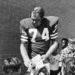 This Nov. 8, 1972 file photo shows Los Angeles Rams' defensive tackle Merlin Olsen signing autographs in Los Angeles. Olsen, a Pro Football Hall of Famer and former television actor, died Wednesday night, March 10, 2010, at a Los Angeles hospital. He was 69. 