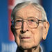 In this Dec. 9, 2005, file photo, former UCLA basketball coach John Wooden listens during a news conference in Anaheim, Calif. 