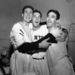 From left, New York Giants' Bobby Thomson, Larry Jansen and Sal Maglie celebrate their win over the Brooklyn Dodgers, and the National League pennant, at the Polo Grounds in New York.