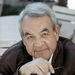 In this Feb. 19, 1990 file photo, actor Tom Bosley, poses during an interview in Los Angeles. 