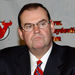 New Jersey Devils coach Pat Burns pauses as he reads a statement during a news conference that he has been diagnosed with colon cancer Sunday, April 18, 2004, in East Rutherford, N.J.