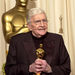 Filmmaker Blake Edwards holds up the honorary Oscar he received from the Board of Governors of the Academy of Motion Picture Arts and Sciences during the 76th annual Academy Awards telecast Sunday, Feb. 29, 2004, in Los Angeles. 